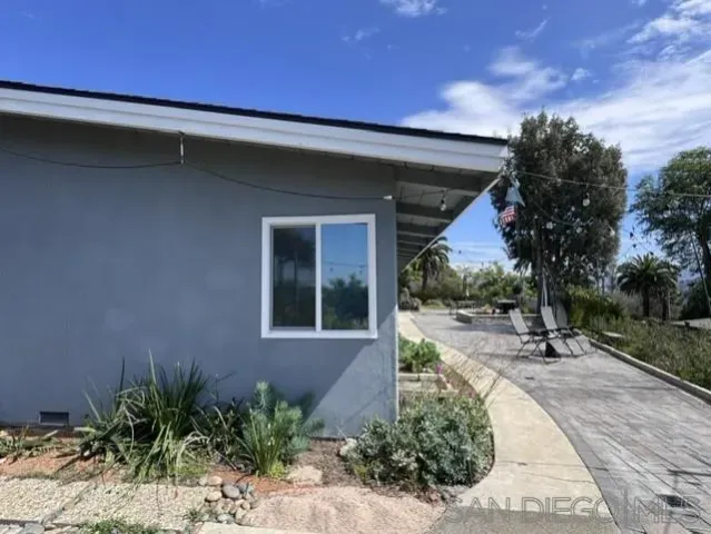 a house view with a outdoor space
