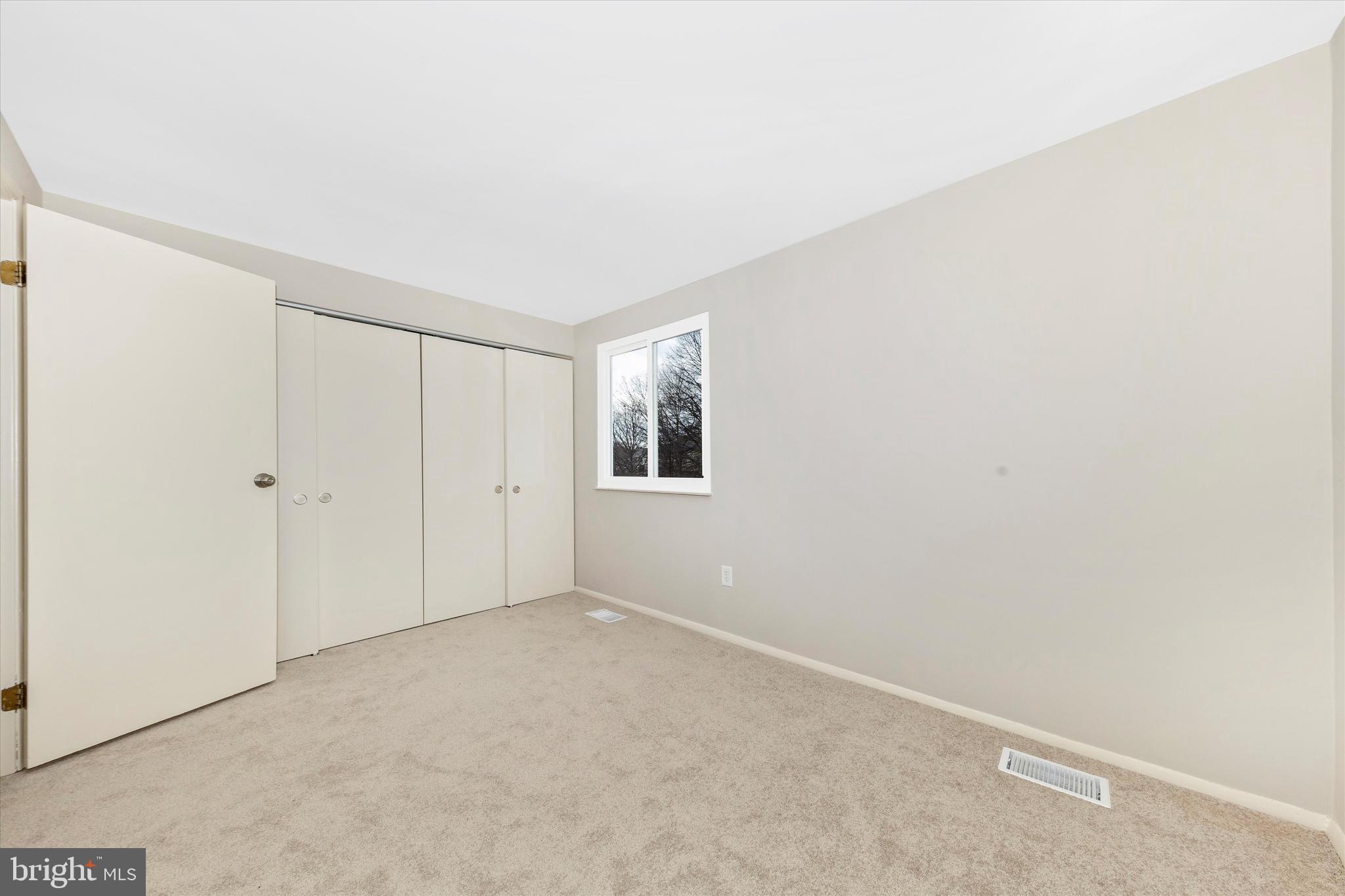 5818 Drawbridge Court Frederick, MD 21703 - Photo 26 of 36 Bedroom #2 with new closet doors