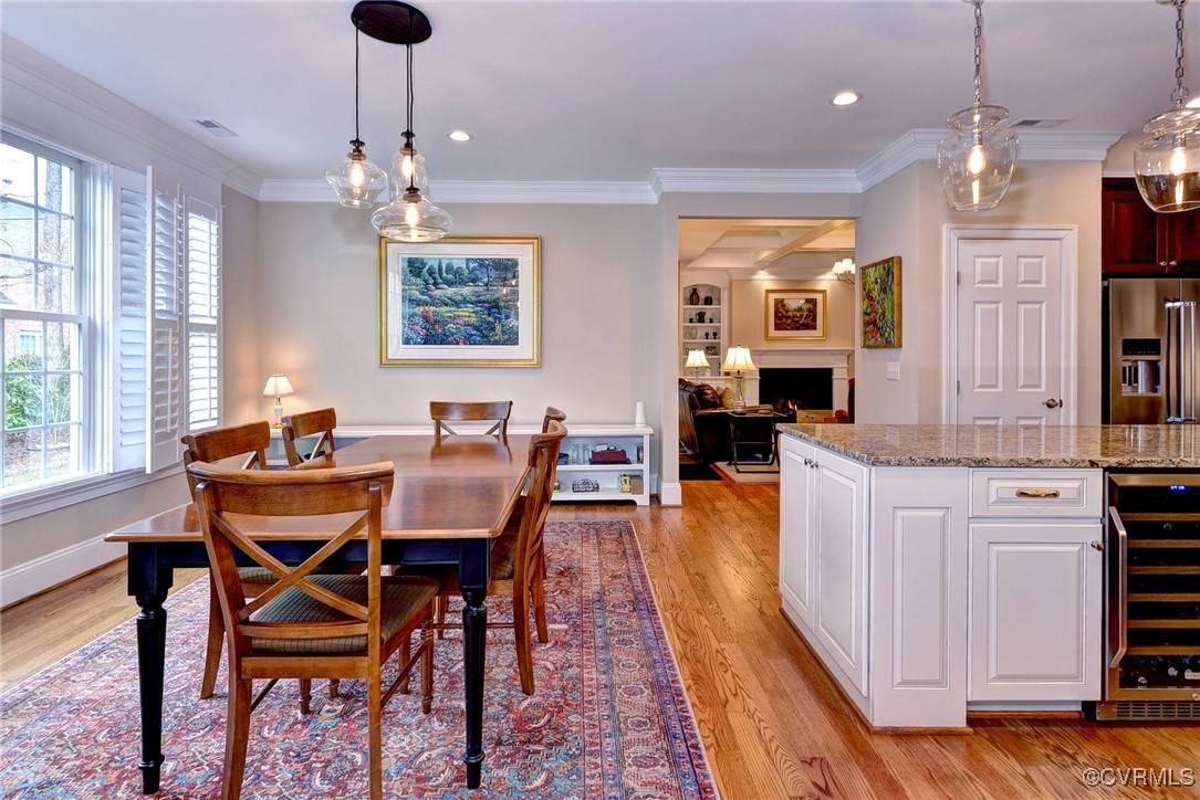104 Edenbridge Williamsburg, VA 23188 - Photo 17 of 50 a dining room with furniture a chandelier and wooden floor