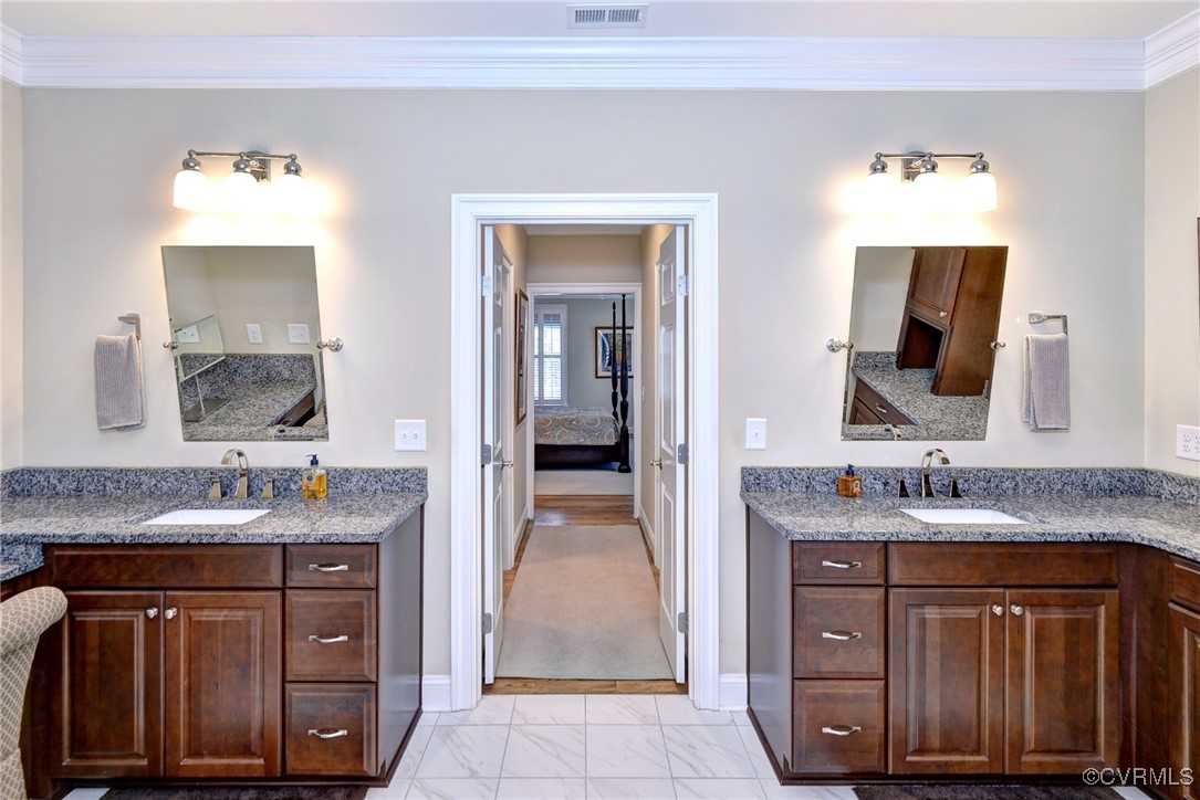 104 Edenbridge Williamsburg, VA 23188 - Photo 24 of 50 a bathroom with a double vanity sink and a mirror