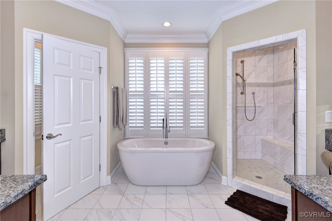 104 Edenbridge Williamsburg, VA 23188 - Photo 25 of 50 a spacious bathroom with a bathtub and shower