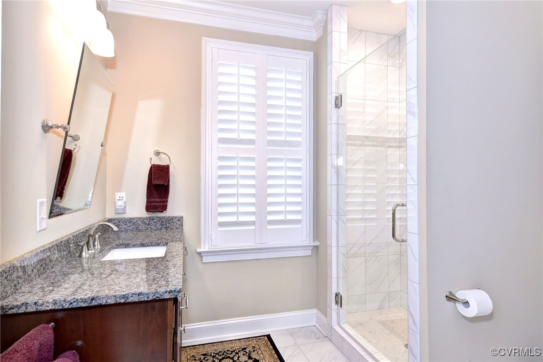 104 Edenbridge Williamsburg, VA 23188 - Photo 31 of 50 a bathroom with a granite countertop sink and a mirror