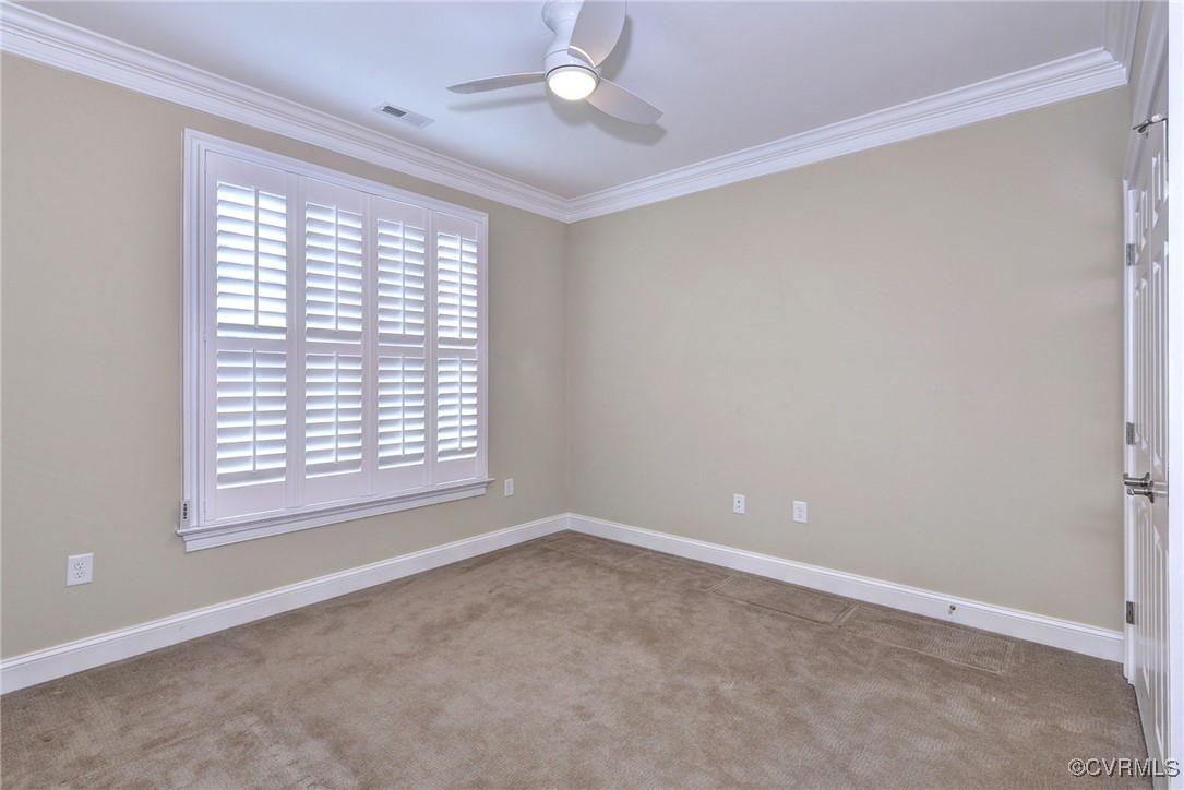 104 Edenbridge Williamsburg, VA 23188 - Photo 32 of 50 a view of an empty room with a window