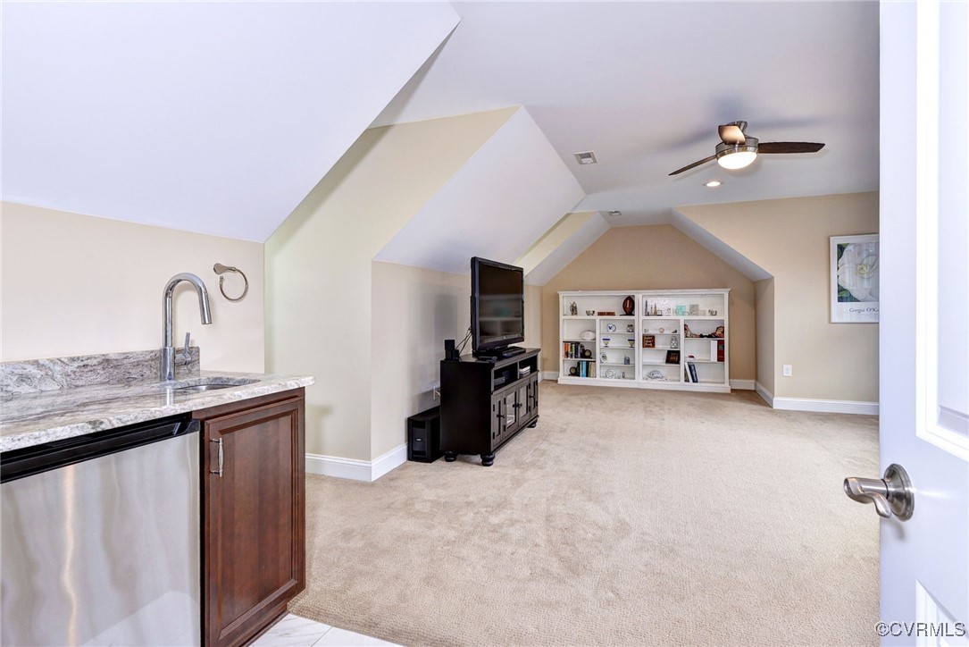104 Edenbridge Williamsburg, VA 23188 - Photo 34 of 50 a kitchen with a sink appliances and a chandelier