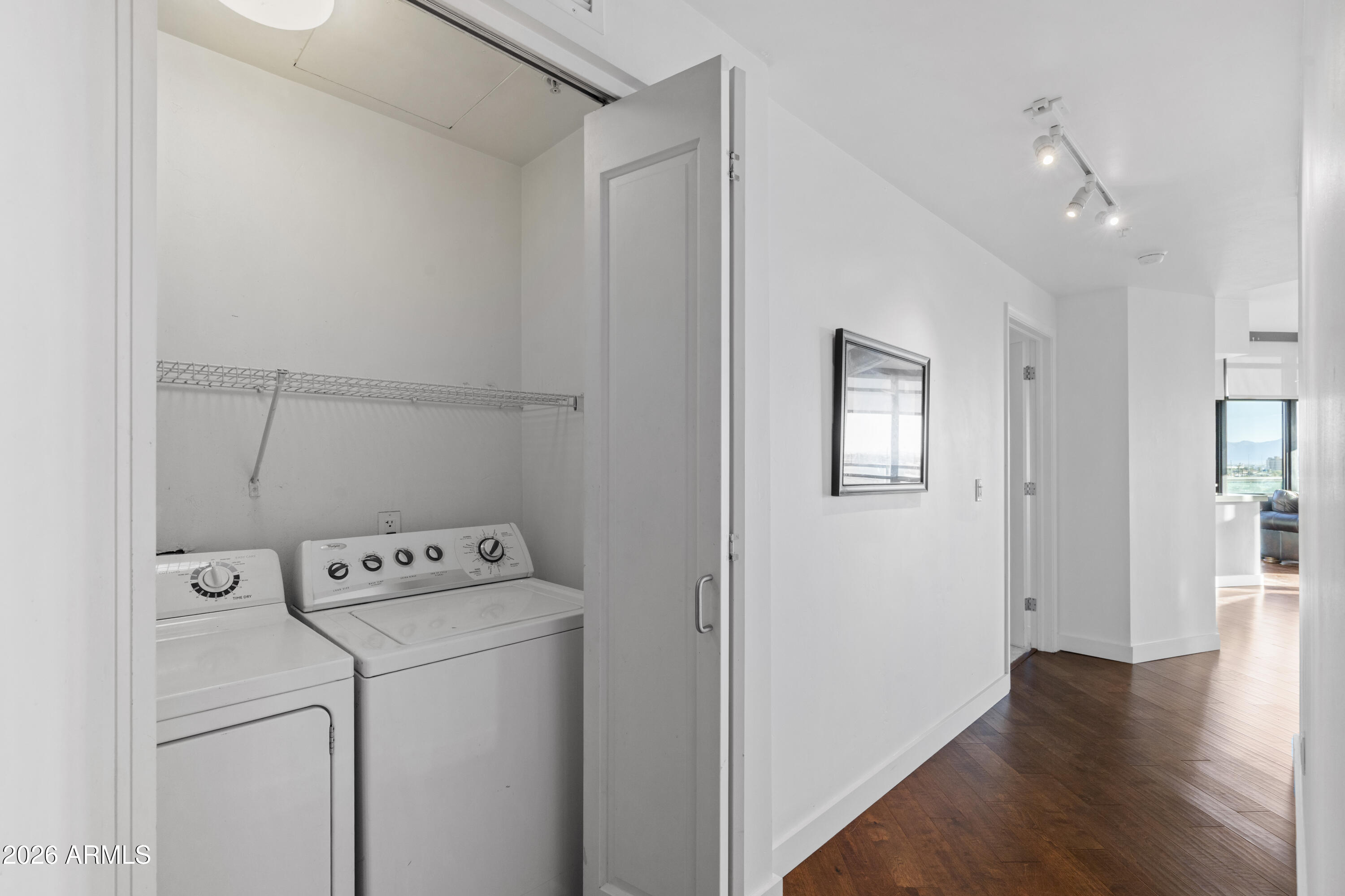 310 South 4th Street, Unit 601 Phoenix, AZ 85004 - Photo 16 of 29 a utility room with dryer and washer