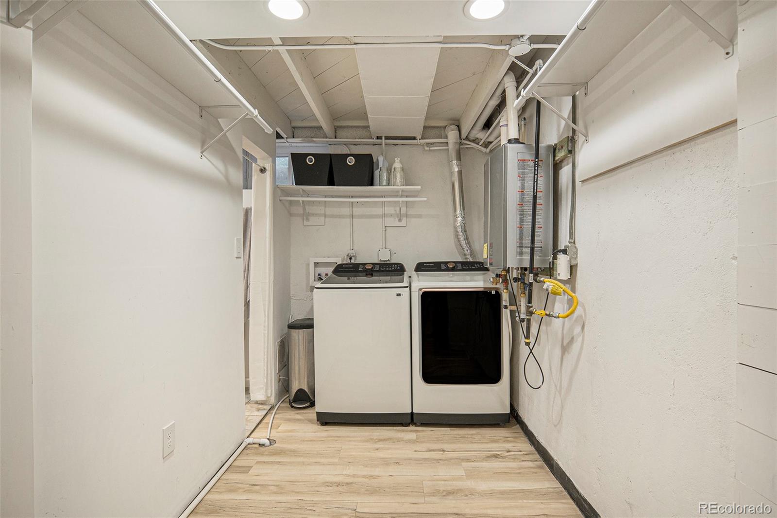 3621 Oneida Street Denver, CO 80207 - Photo 24 of 35 a utility room with dryer and washer