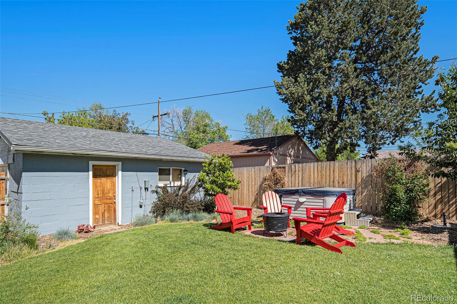 3621 Oneida Street Denver, CO 80207 - Photo 27 of 35 a view of back yard with outdoor seating