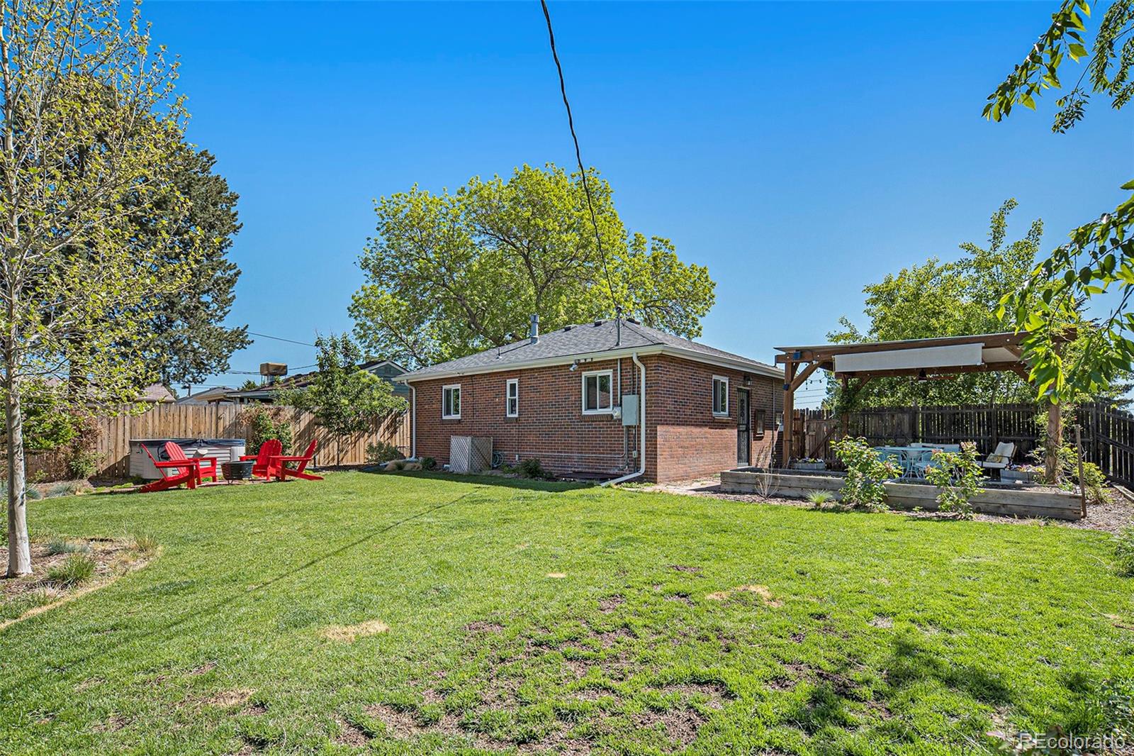 3621 Oneida Street Denver, CO 80207 - Photo 28 of 35 a view of a house with a yard