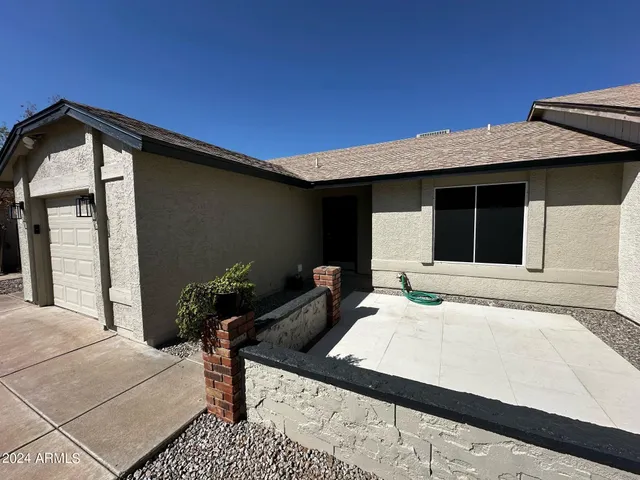 a house view with a outdoor space