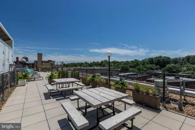 a view of a terrace with furniture and outdoor seating