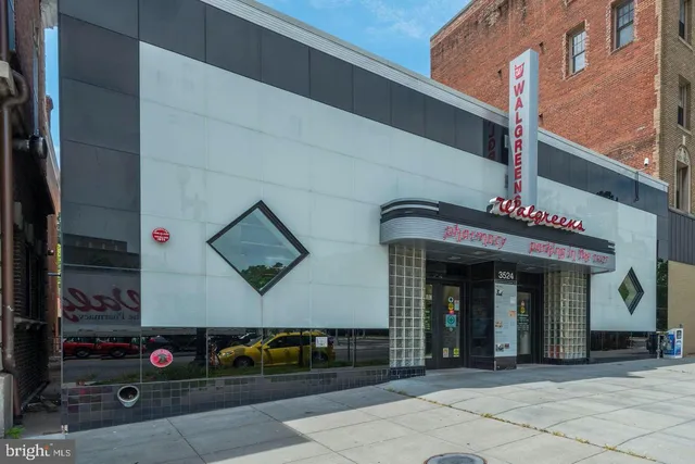 a view of a food mall next to a road
