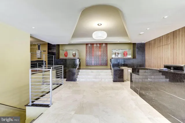 a kitchen with counter top space cabinets and stainless steel appliances