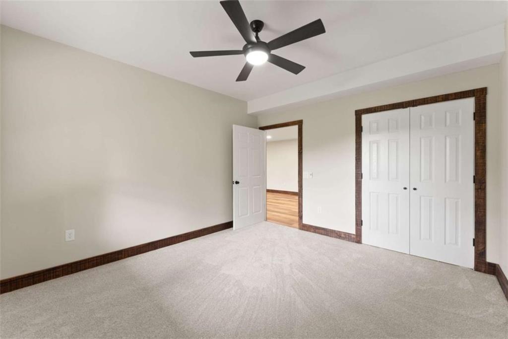 707 South Fern Cove Road Sautee Nacoochee, GA 30571 - Photo 30 of 60 a view of an empty room and a ceiling fan