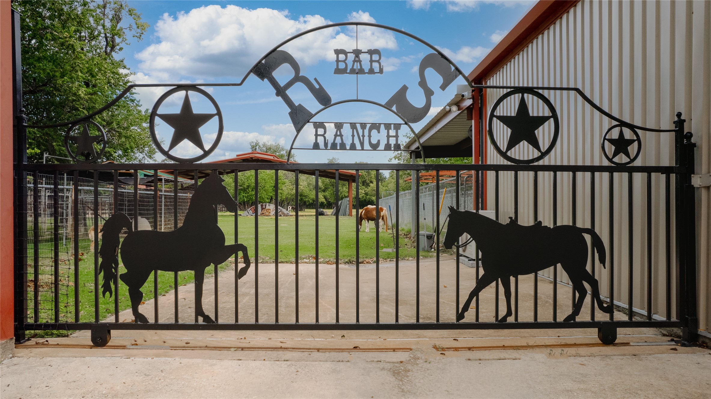 7438 Wright Road Houston, TX 77041 - Photo 34 of 50 The gate leading to the ranch portion of the property,