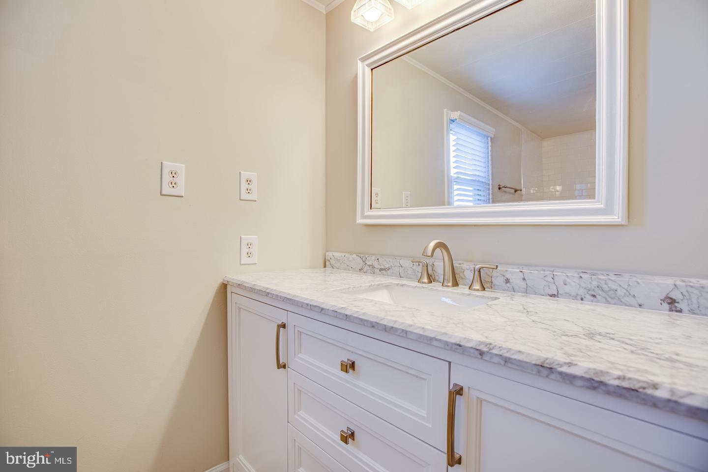 6181 3rd Street King George, VA 22485 - Photo 16 of 39 Elegant marble vanity in bath.