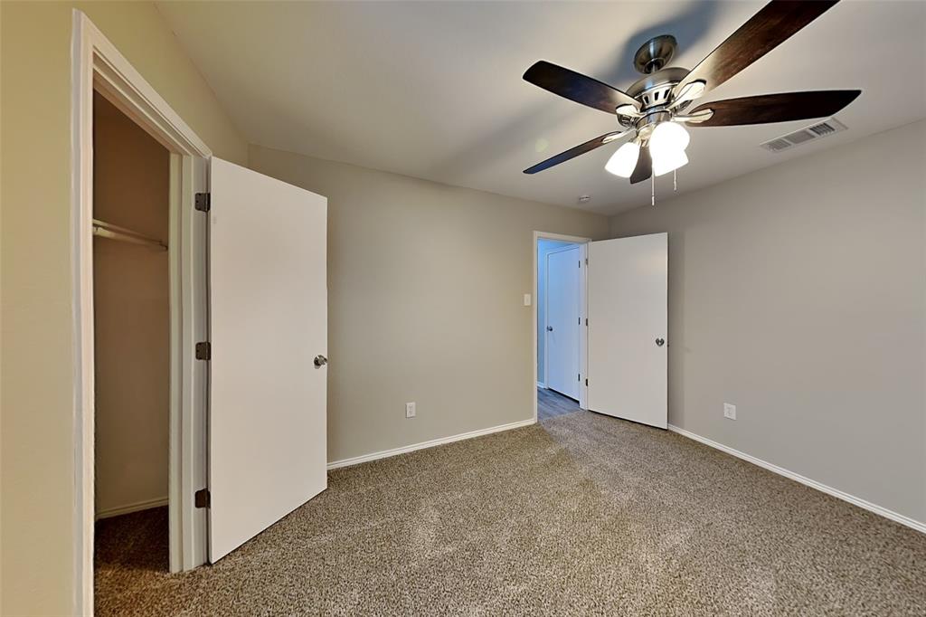 8844 Quarry Ridge Trail Fort Worth, TX 76244 - Photo 10 of 18 Unfurnished bedroom with carpet floors and a ceiling fan