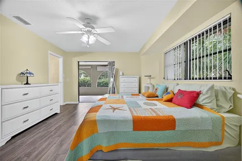 a bathroom with a double vanity sink a mirror and shower