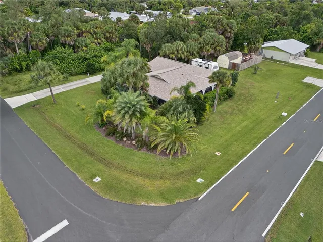 an aerial view of a house with garden