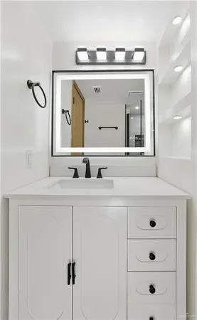 a view of empty room with windows