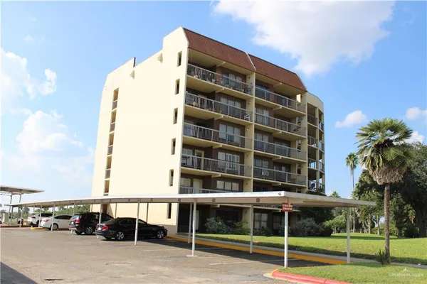 a building with trees in front of it