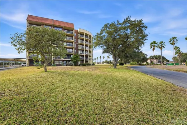 a view of a patio with a garden