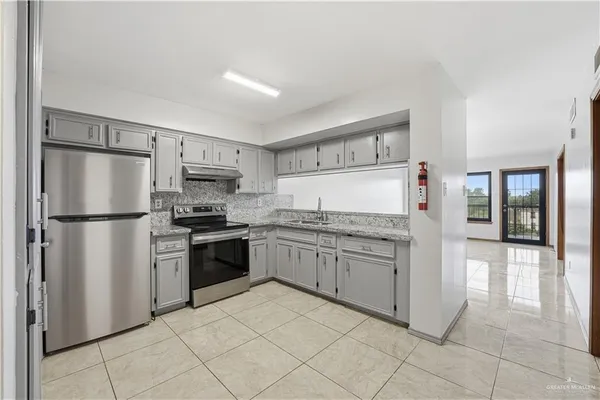 a view of a livingroom and dining room