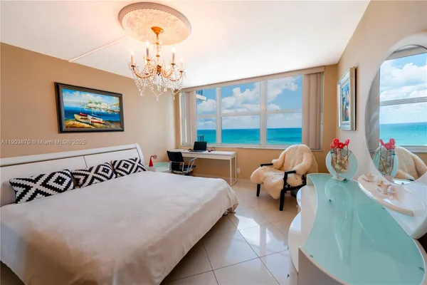 a bedroom with bed and window