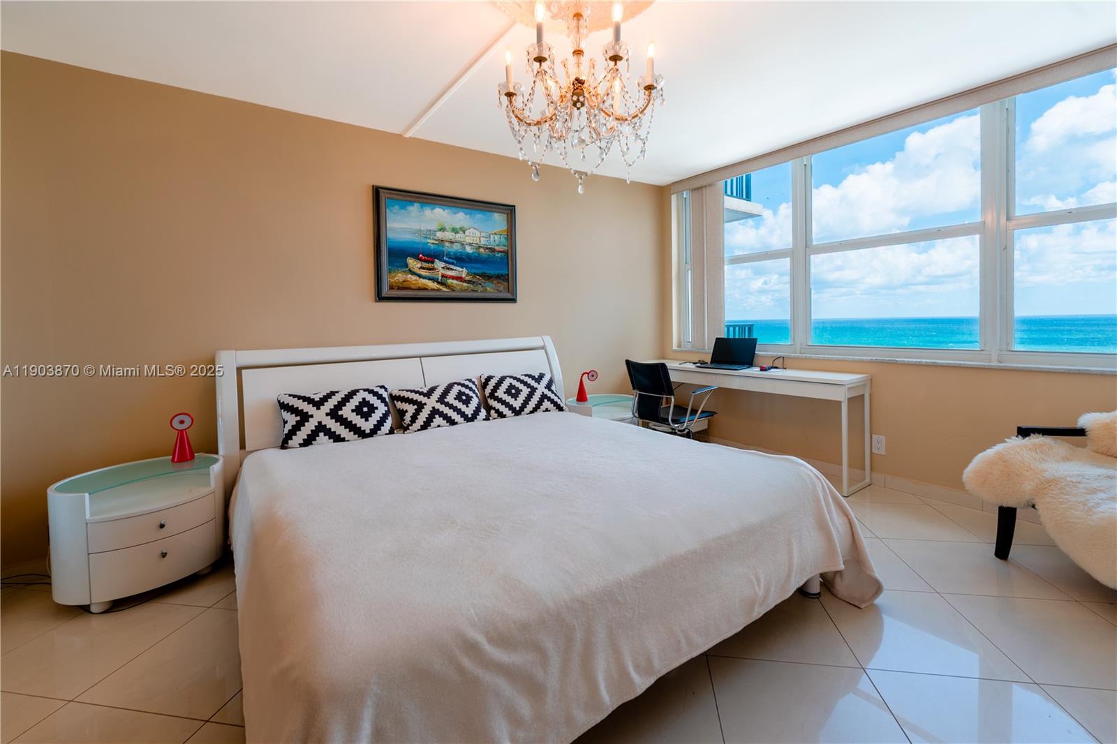2101 South Ocean Drive, Unit 2002 Hollywood, FL 33019 - Photo 16 of 23 a bedroom with a bed and a window