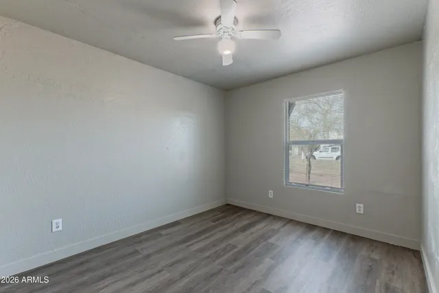 a utility room with sink dryer and washer