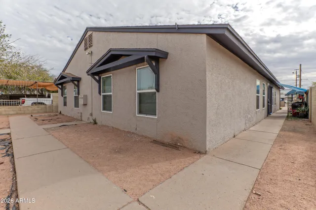 a house with trees in front of it