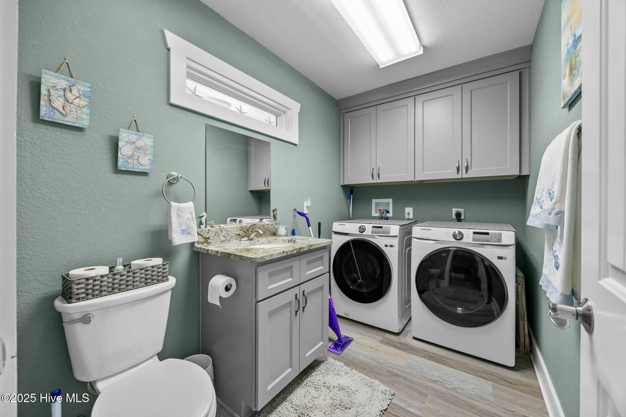 2364 Carova Road Corolla, NC 27927 - Photo 12 of 27 1/2 bath and laundry upstairs