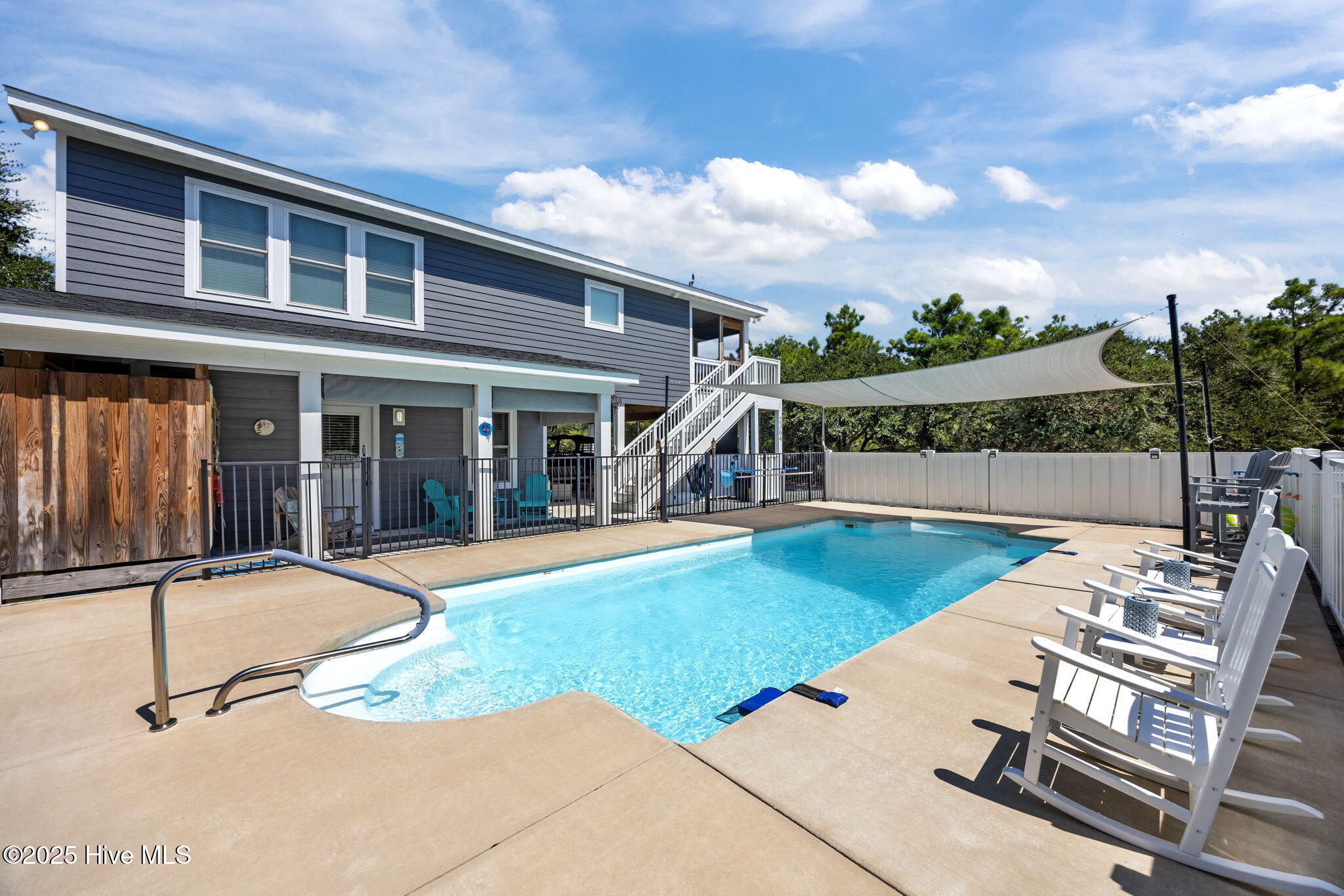 2364 Carova Road Corolla, NC 27927 - Photo 13 of 27 Pool with large patio and sun sail