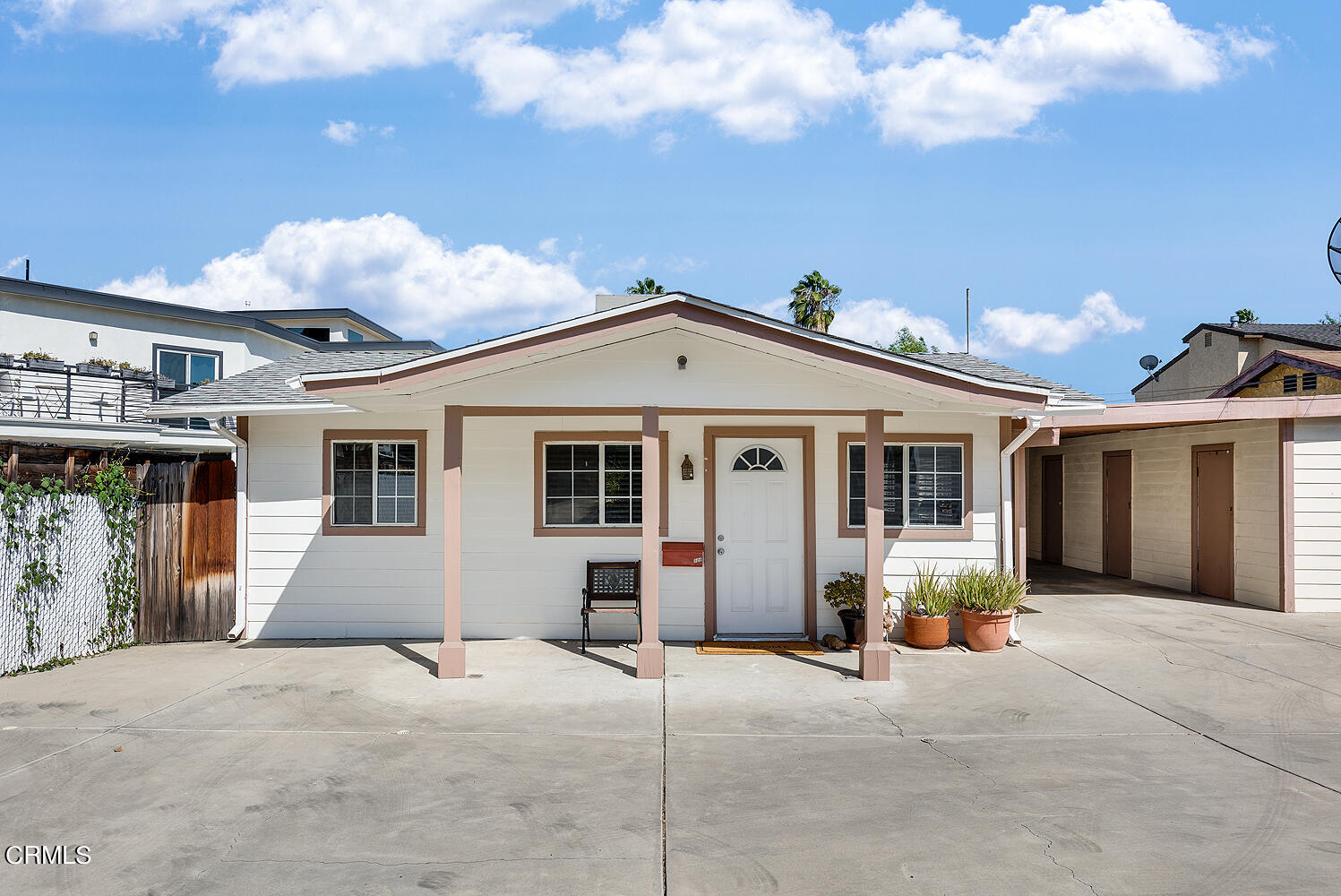504 North Catalina Avenue Pasadena, CA 91106 - Photo 3 of 42 a front view of a house with a yard and garage