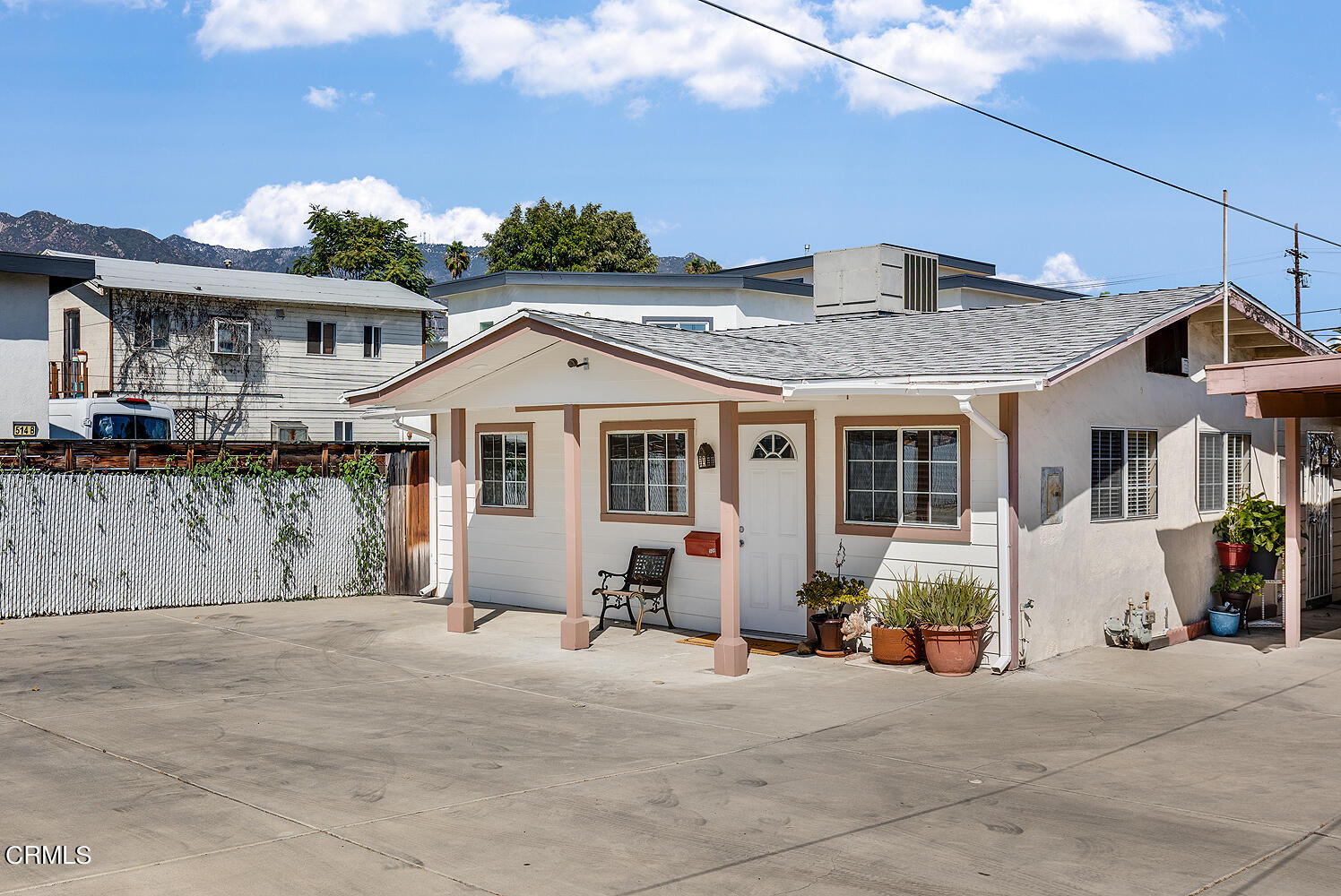 504 North Catalina Avenue Pasadena, CA 91106 - Photo 4 of 42 a view of a white house with a outdoor space