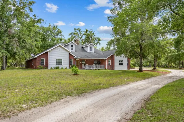 a view of a patio with wooden floor