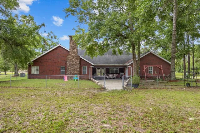 a view of a lake with a tree