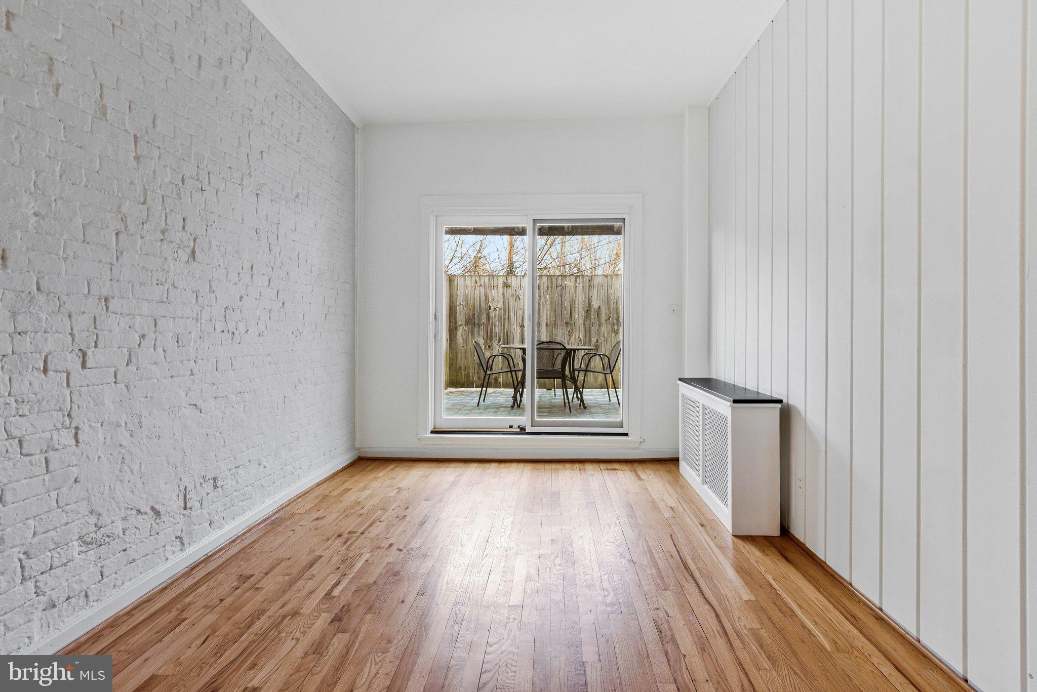 511 2nd Street Southeast Washington, DC 20003 - Photo 15 of 32 Bright sliders to back deck (over garage.)