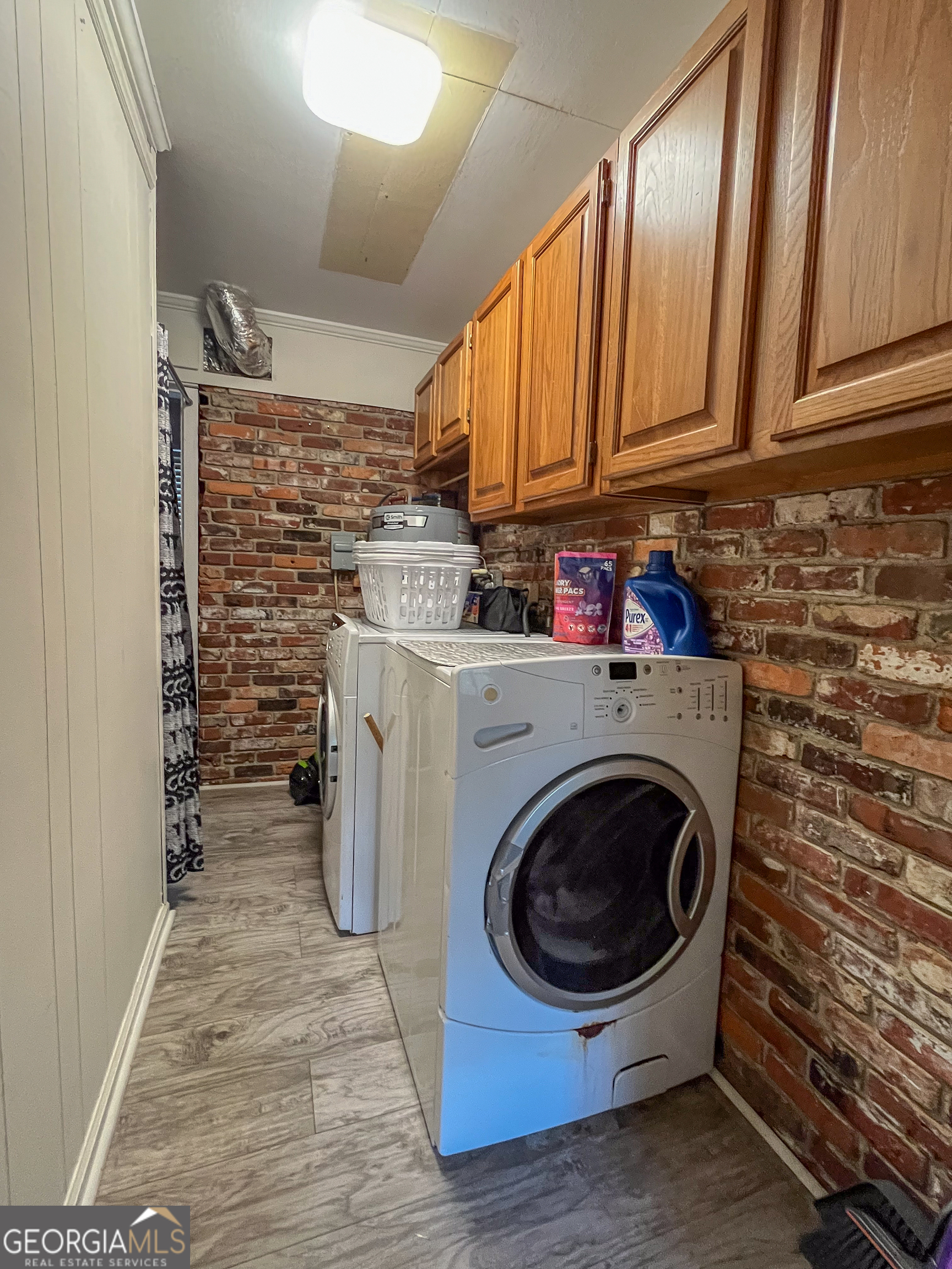 218 Pinehurst Drive Dublin, GA 31021 - Photo 25 of 38 a utility room with dryer and washer