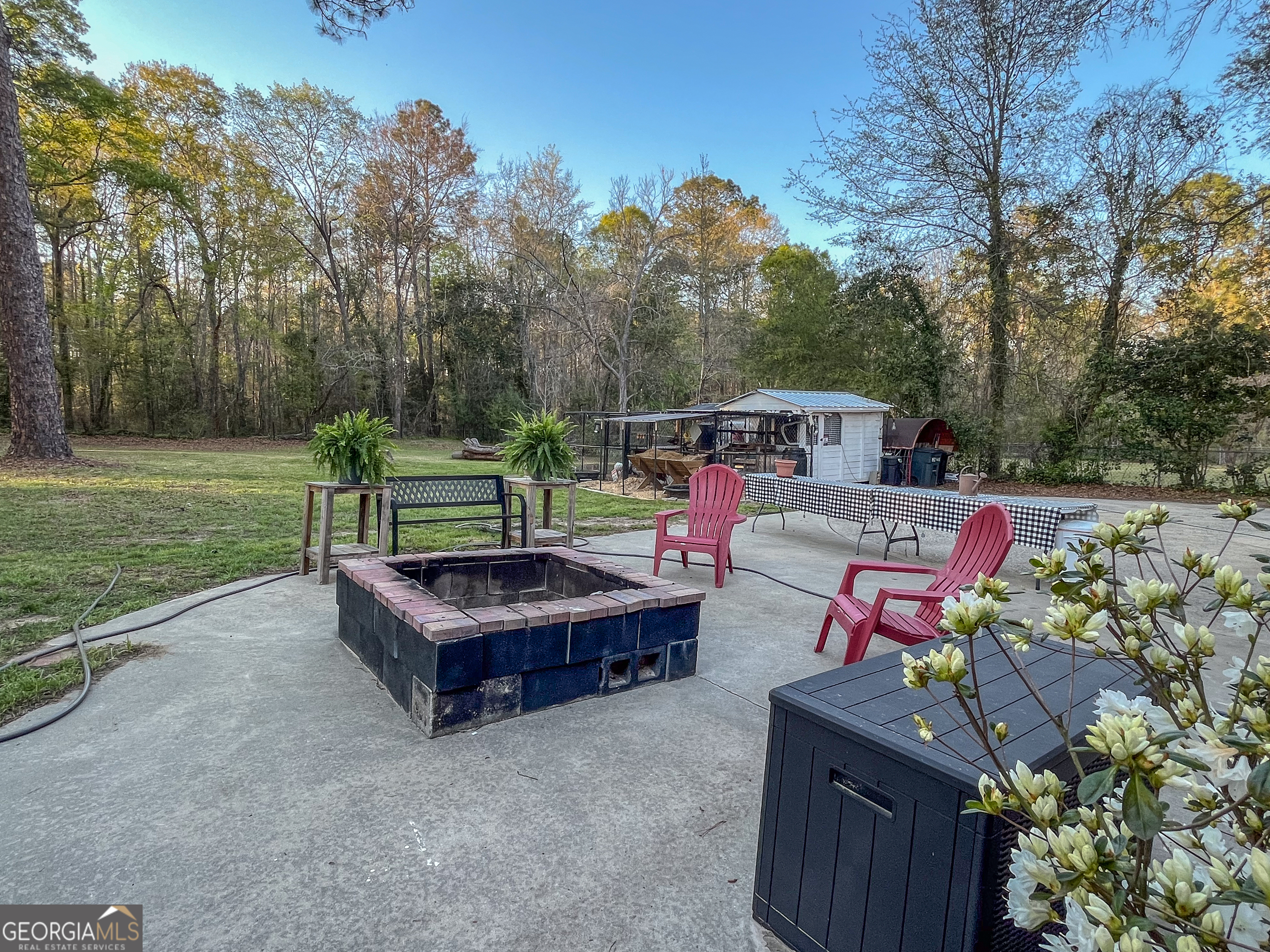 218 Pinehurst Drive Dublin, GA 31021 - Photo 33 of 38 a view of a deck with a backyard and trees