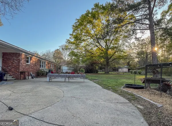 a view of a yard with tree s