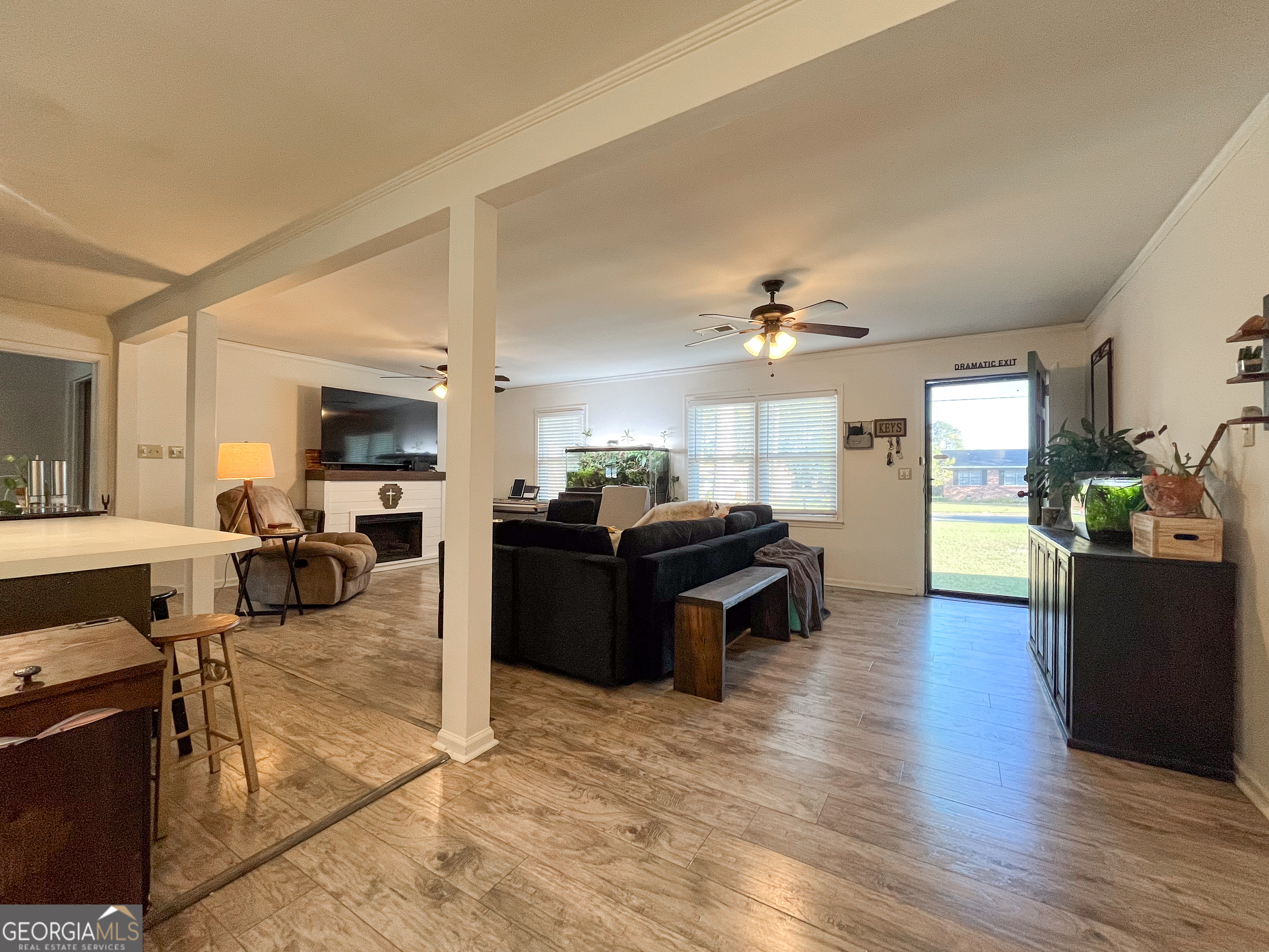 218 Pinehurst Drive Dublin, GA 31021 - Photo 5 of 38 a living room with furniture and a wooden floor