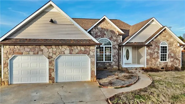 a front view of a house with a porch