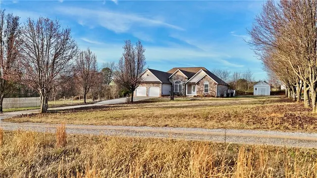 a view of ocean view with large trees