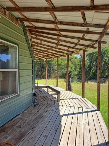 a view of swimming pool with seating space