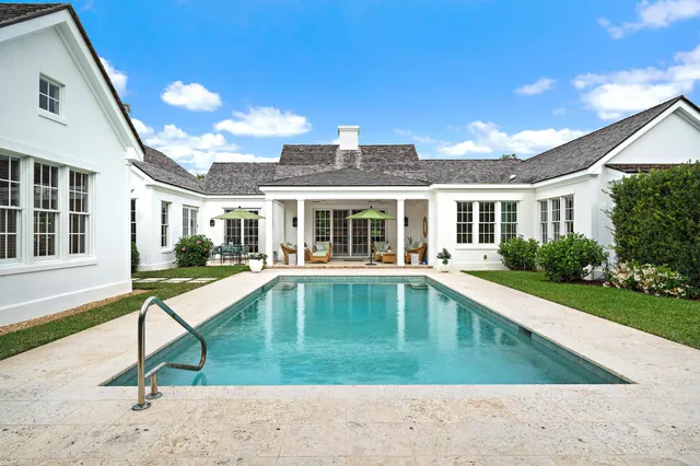 a view of a house with swimming pool