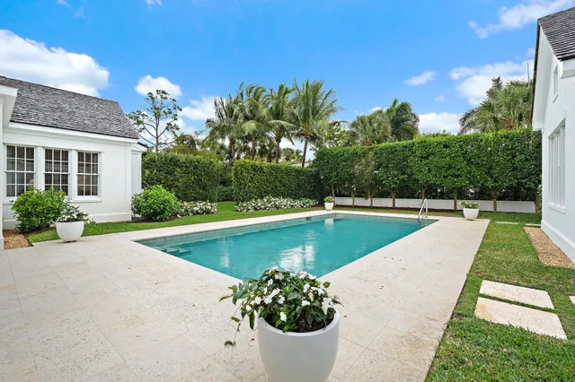 a view of a swimming pool with a patio