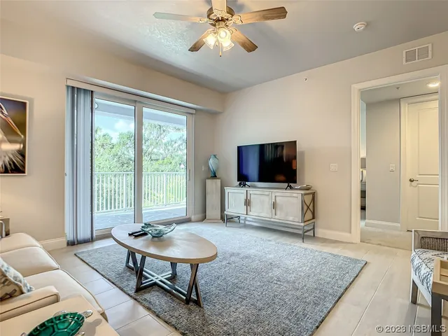 a bedroom with a bed and a mirror