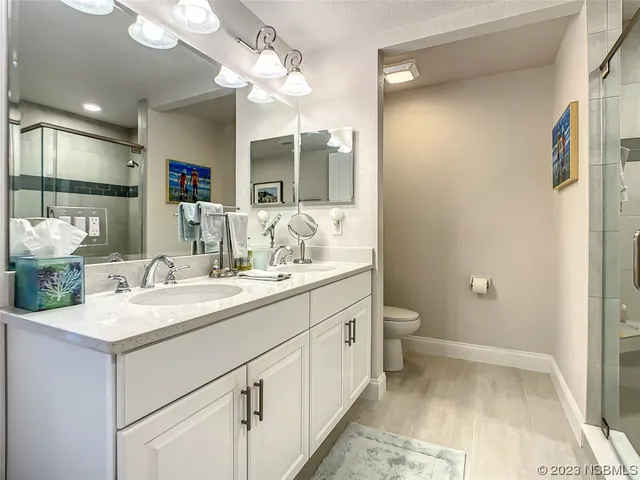 a view of a door and a window