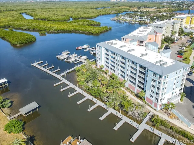 a view of a city with an ocean view