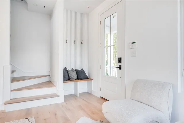 a bathroom with a toilet tub and shower